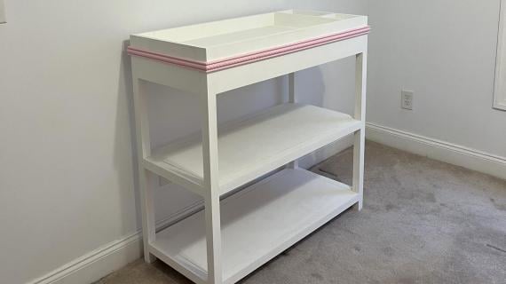 White company changing outlet table